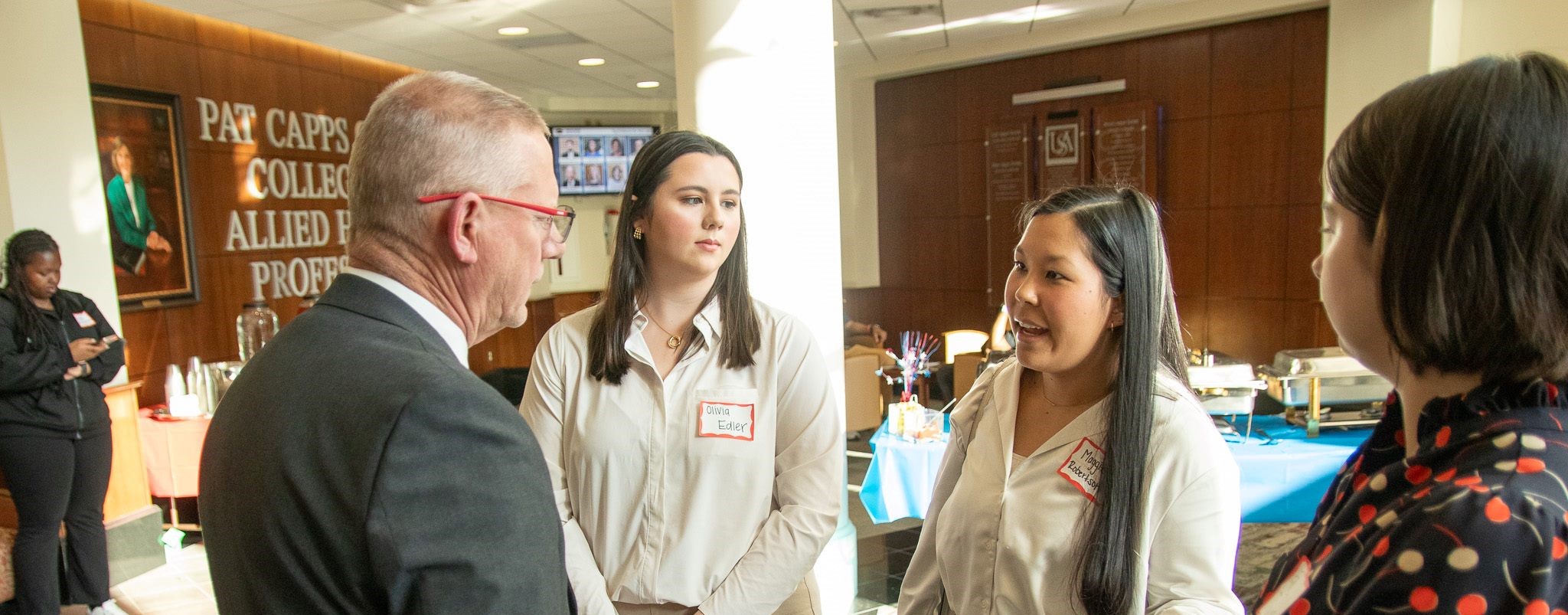 Image of EMS instructor talking to students.