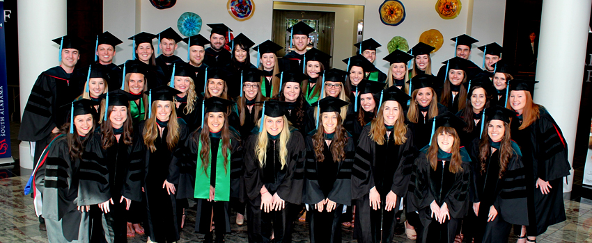 Image of a group of graduates.
