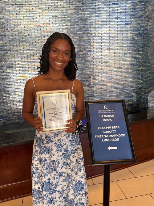 Bria with award