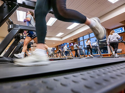 Group running and walking on treadmills.