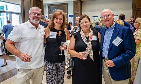 Group of alumni at event