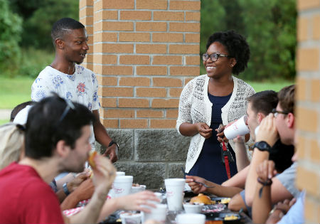 Medical students gather together at the college-wide fall cookout.