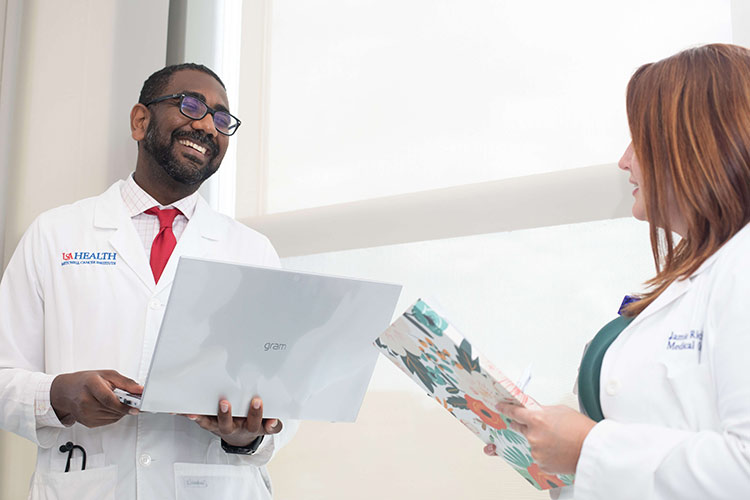 Abdalla with colleague