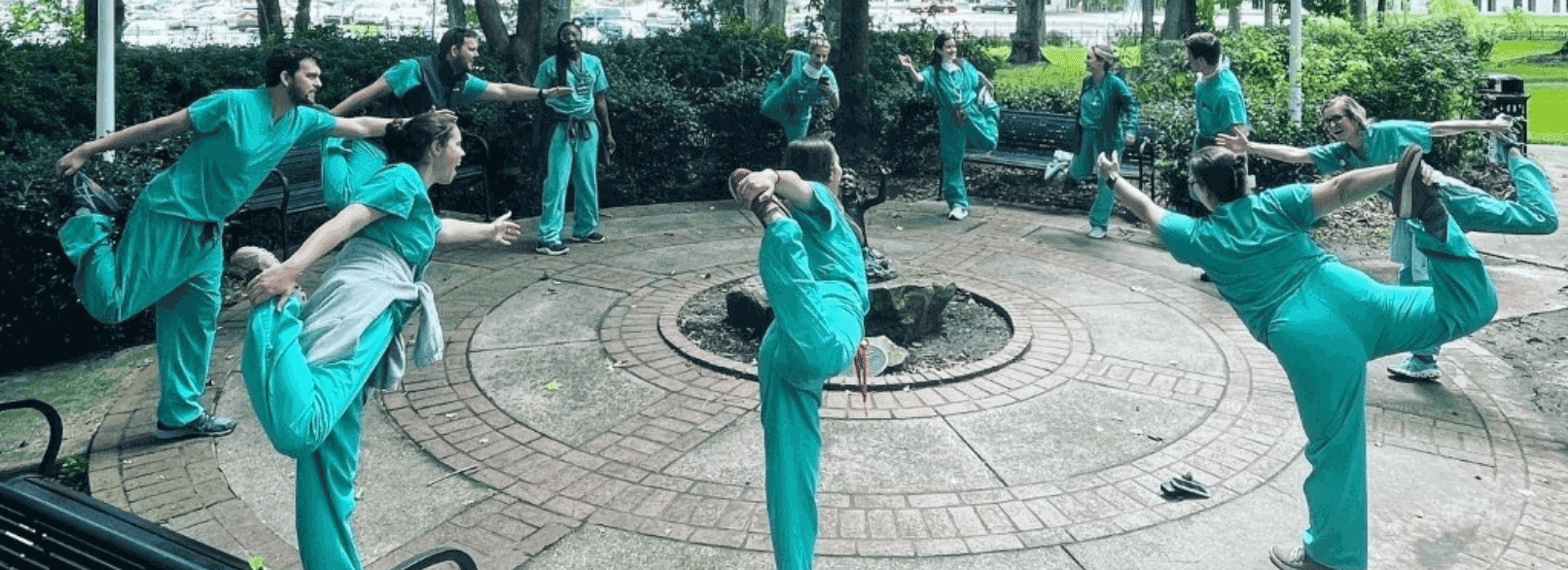 Obstetrics & Gynecology perform yoga exercises.