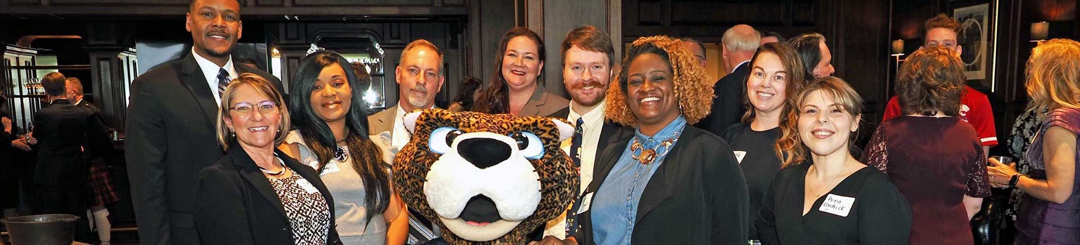 Group image from spring celebration with Mr. Paw