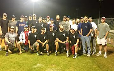 Sigma Chi group picture while playing intramural sports.