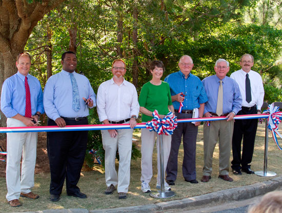 Glenn Sebastian Nature Trail Dedicated – More than 200 people attended the dedication of the Glenn Sebastian Nature Trail recently on the University’s main campus. Cutting the ribbon for the trail, which is named for geographer and Professor Emeritus Dr. Glenn Sebastian, are, from left, Brian Allred, assistant director of campus recreation; Colin Al-Greene, president, Student Government Association; Dr. Doug Marshall, vice president of USA Faculty Senate and associate professor of sociology; Dr. Miriam Fearn, professor and chair of earth sciences; Sebastian; President Gordon Moulton; and Dr. Andrzej Wierzbicki, dean of the College of Arts and Sciences.