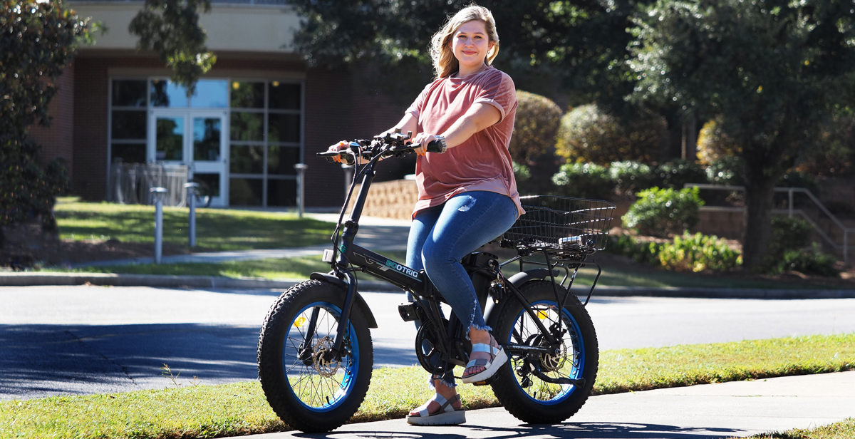 At the University of South Alabama, where she is a freshman, Claudia Allday is studying nursing and travels campus on an electric bicycle. data-lightbox='featured'