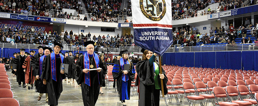 Faculty in the Graduation Processional in the Mitchell Center