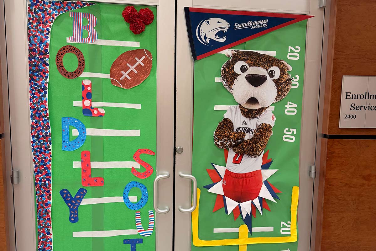 Door decorated with Southpaw and Boldly South. Door decorated with Southpaw and Boldly South.